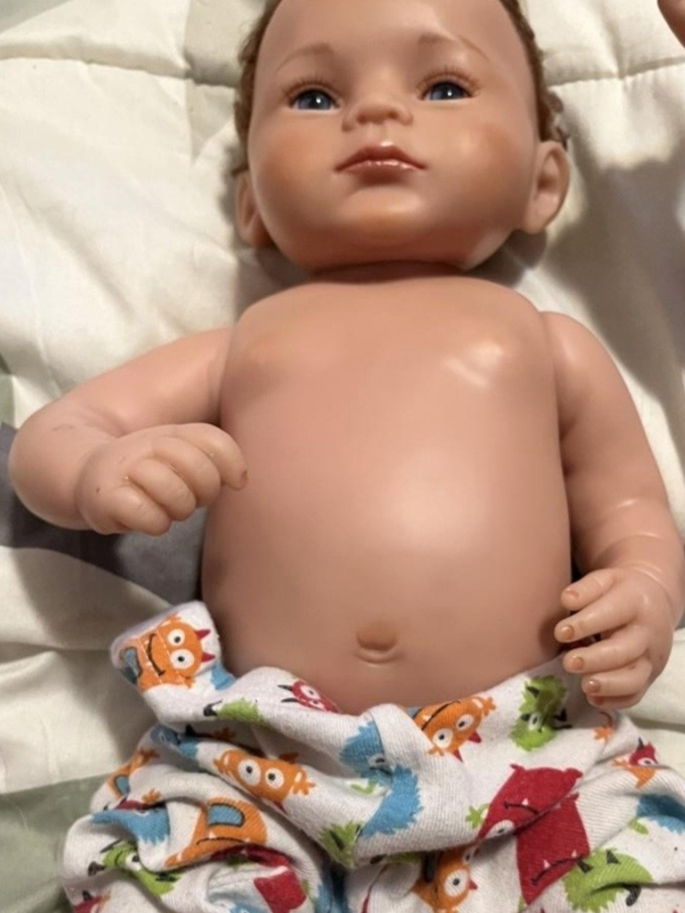 Reborn Baby Doll with Blue Eyes and Colorful Monster Pants
